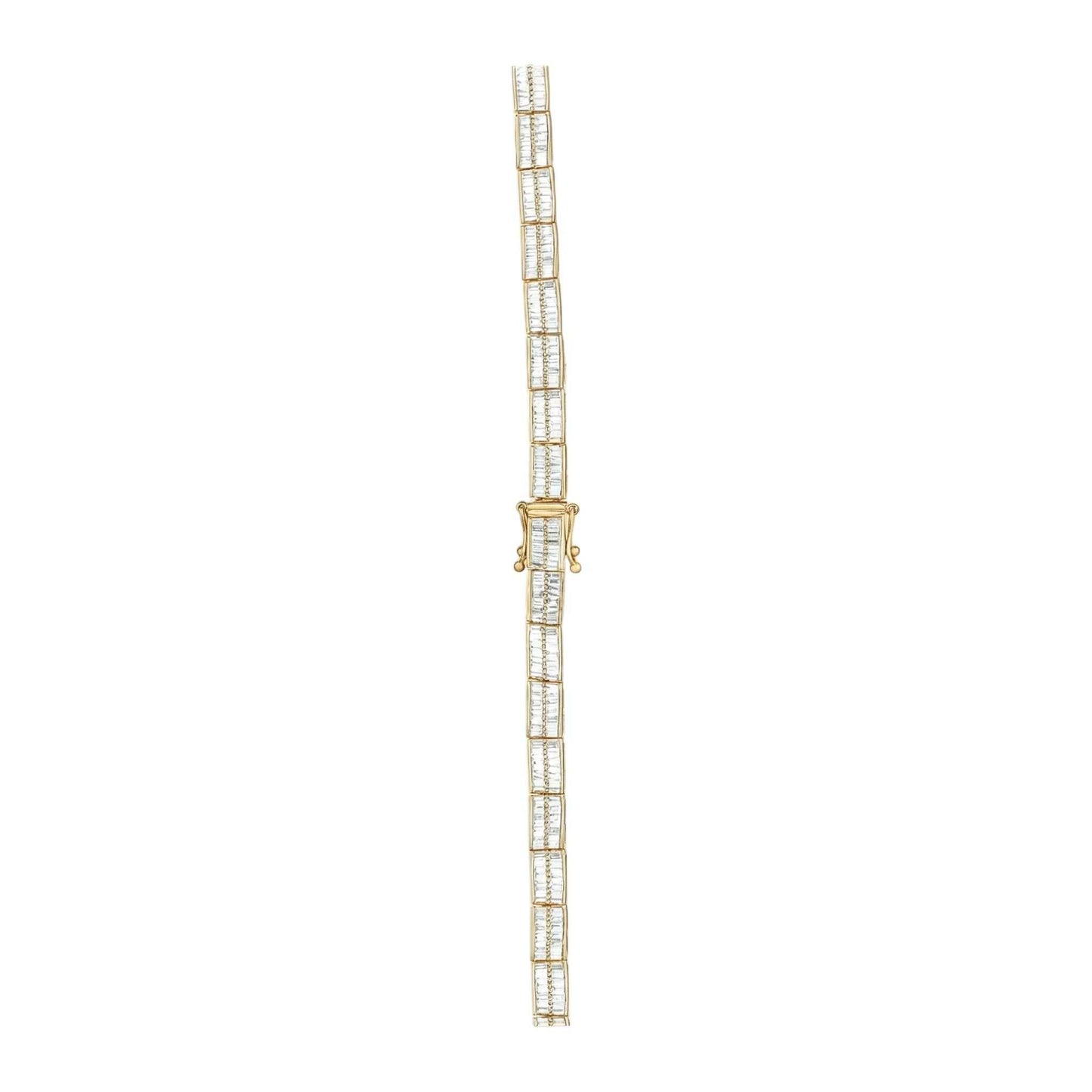 Gold bracelet with clear stones on a white background