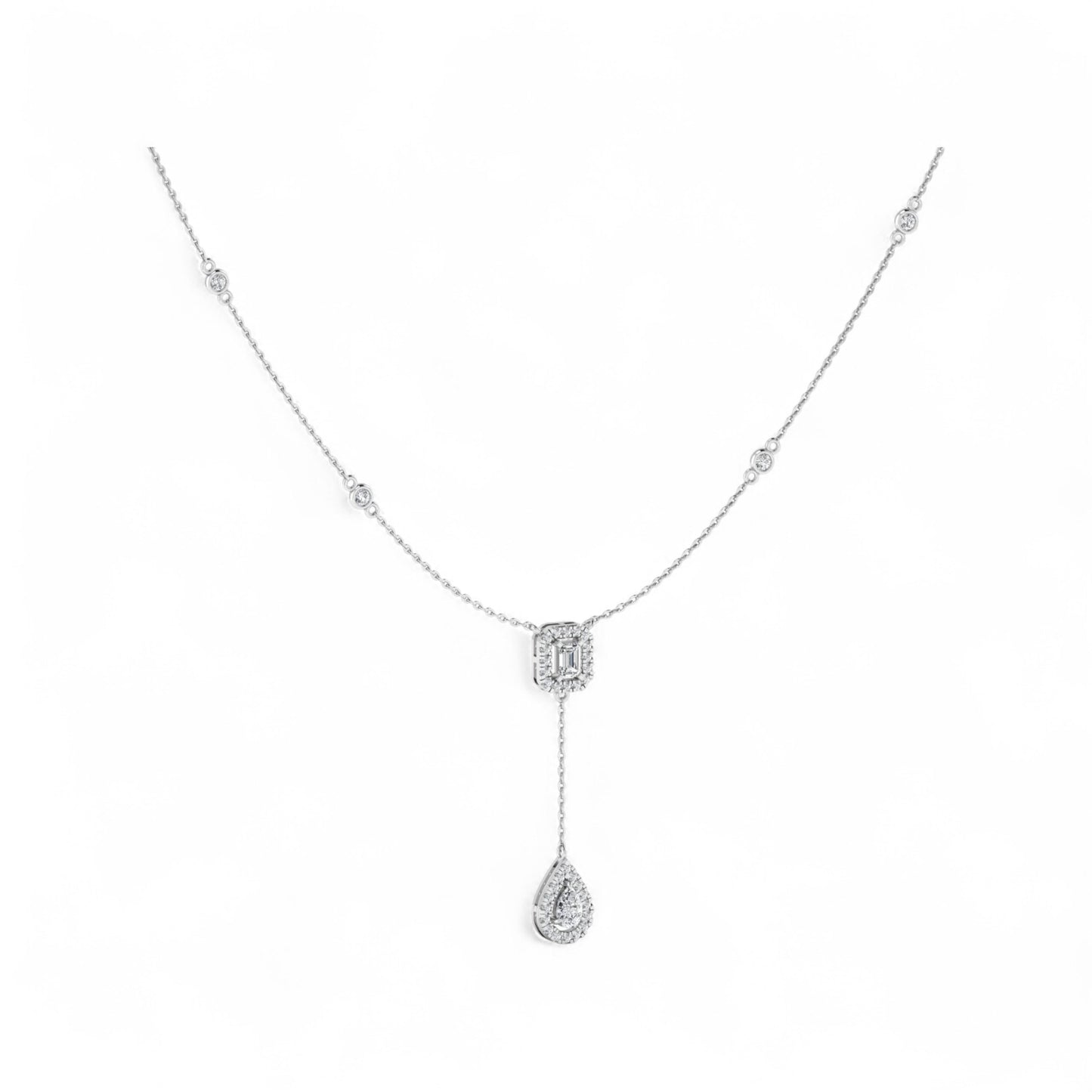 Silver necklace with a teardrop pendant on a white background