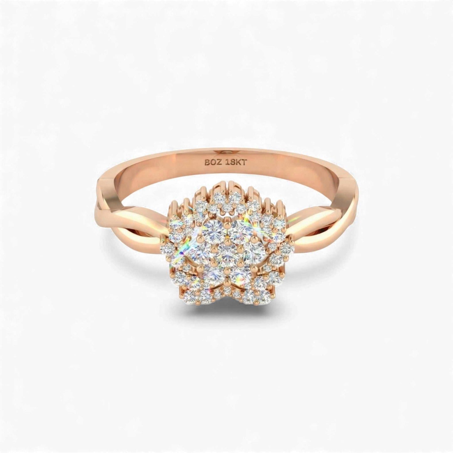 Rose gold ring with diamond cluster on a white background