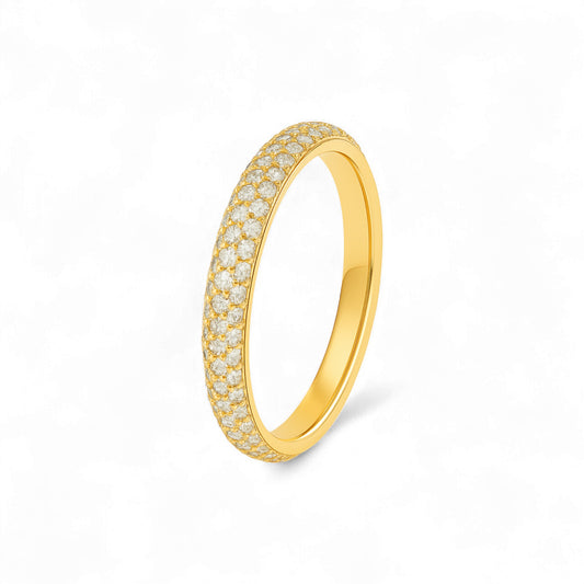 Gold ring with embedded diamonds on a white background
