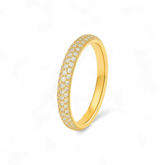 Gold ring with embedded diamonds on a white background