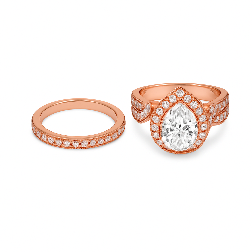 Rose gold ring with pear-shaped diamond and smaller diamond-studded band on a white background