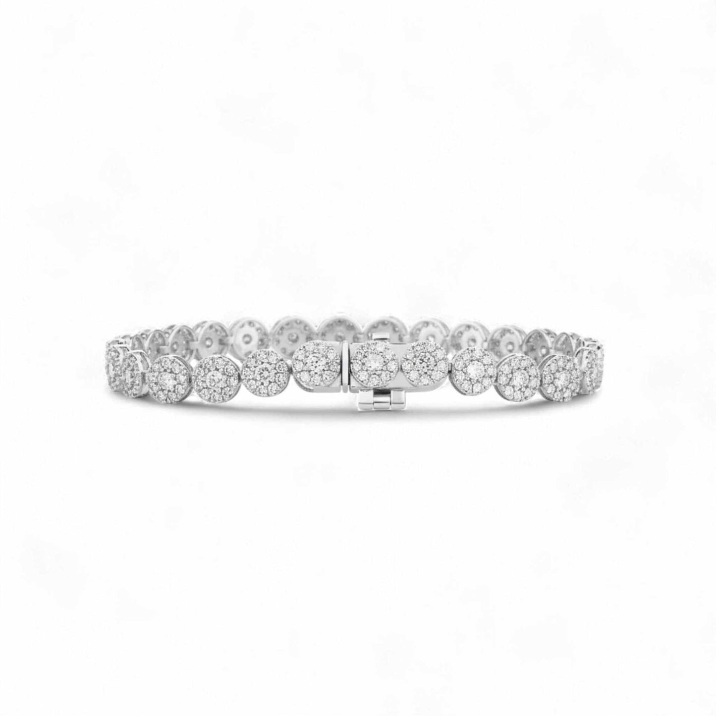 Silver bracelet with clear stones on a white background