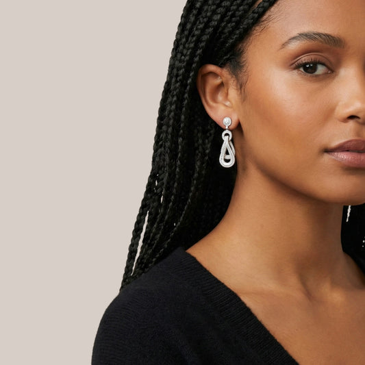 Boucles d'oreilles entrelacées en diamant et or 18 carats