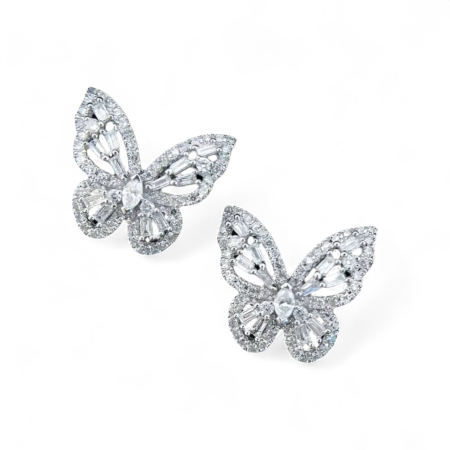 Butterfly-shaped earrings with gemstones on a white background