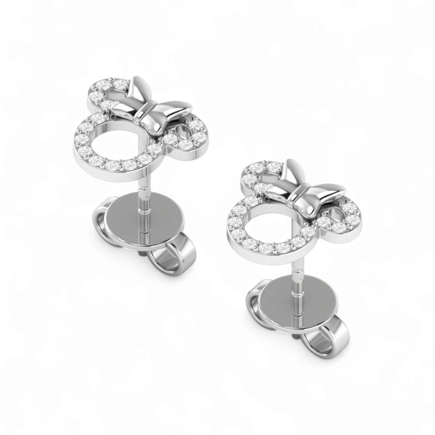 Silver bow-shaped earrings with clear gemstones on a white background