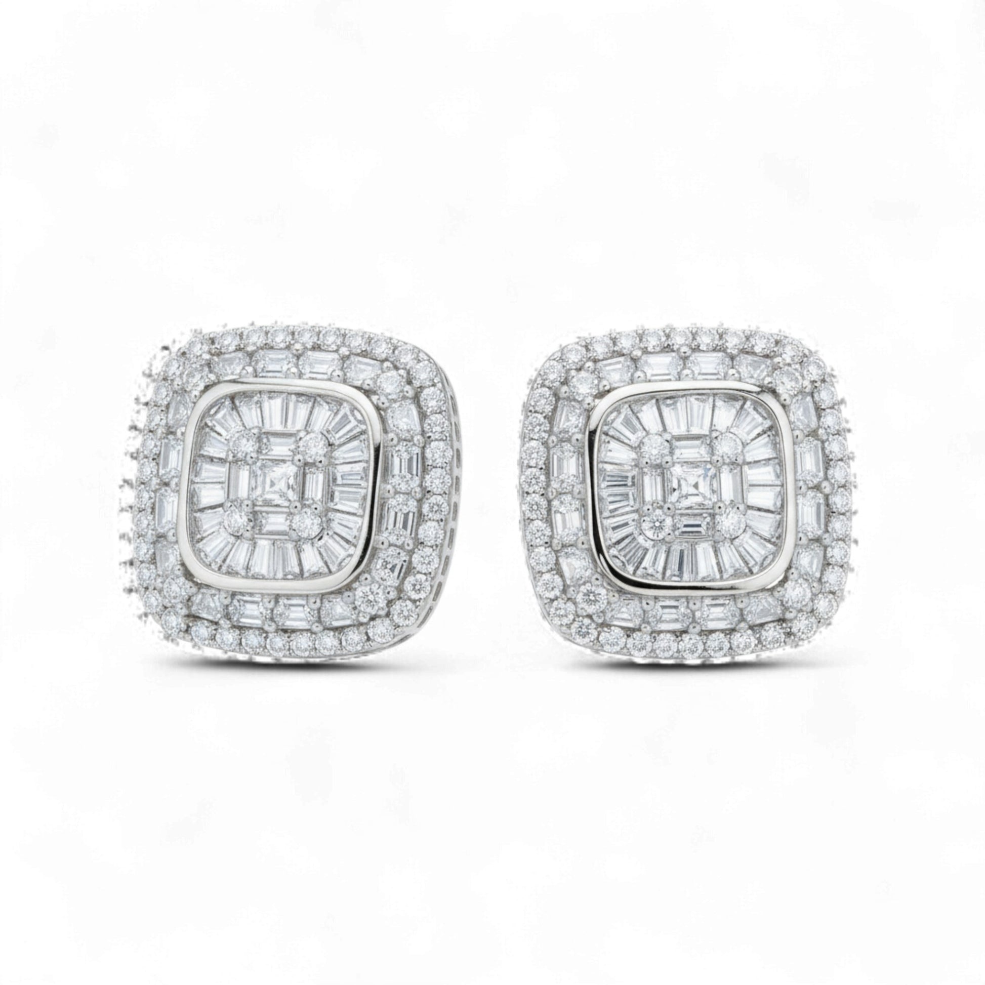 Pair of diamond earrings on a white background