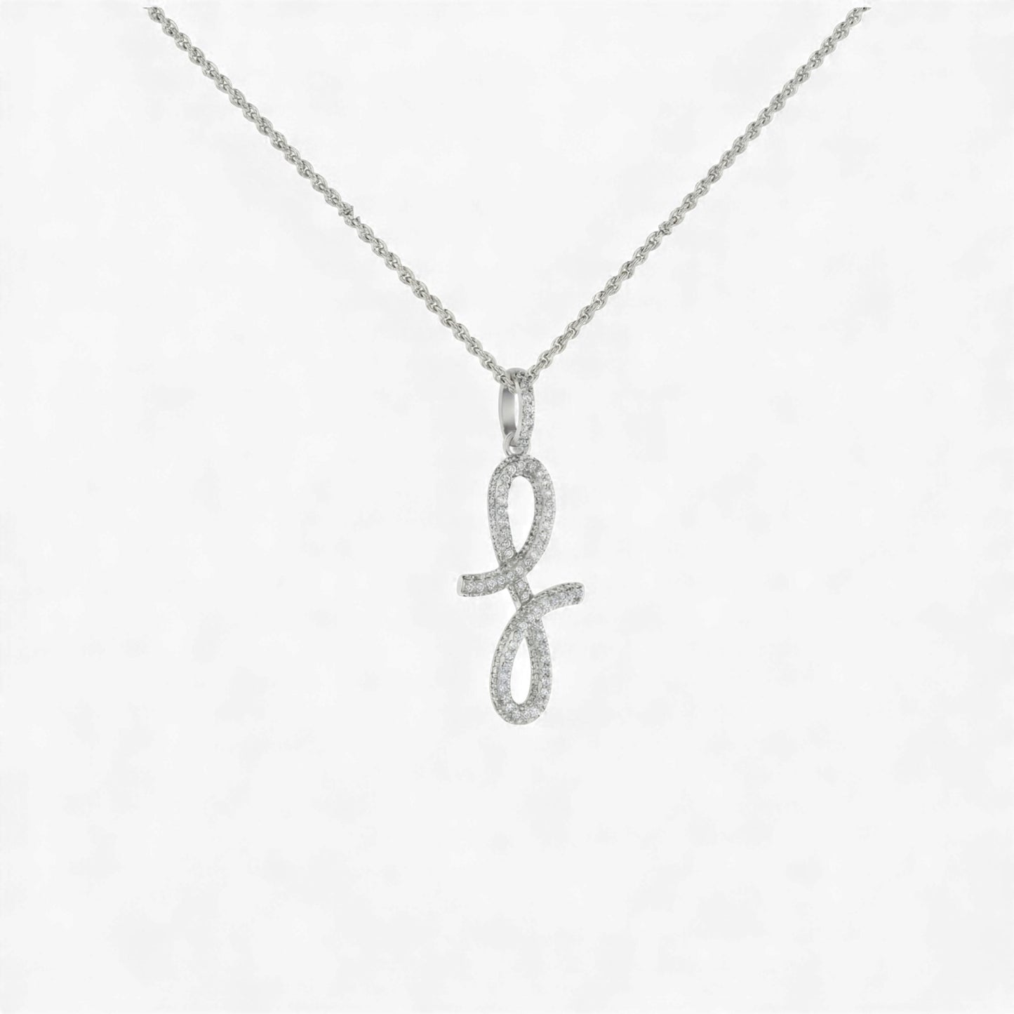 Silver necklace with a unique pendant on a light gray background