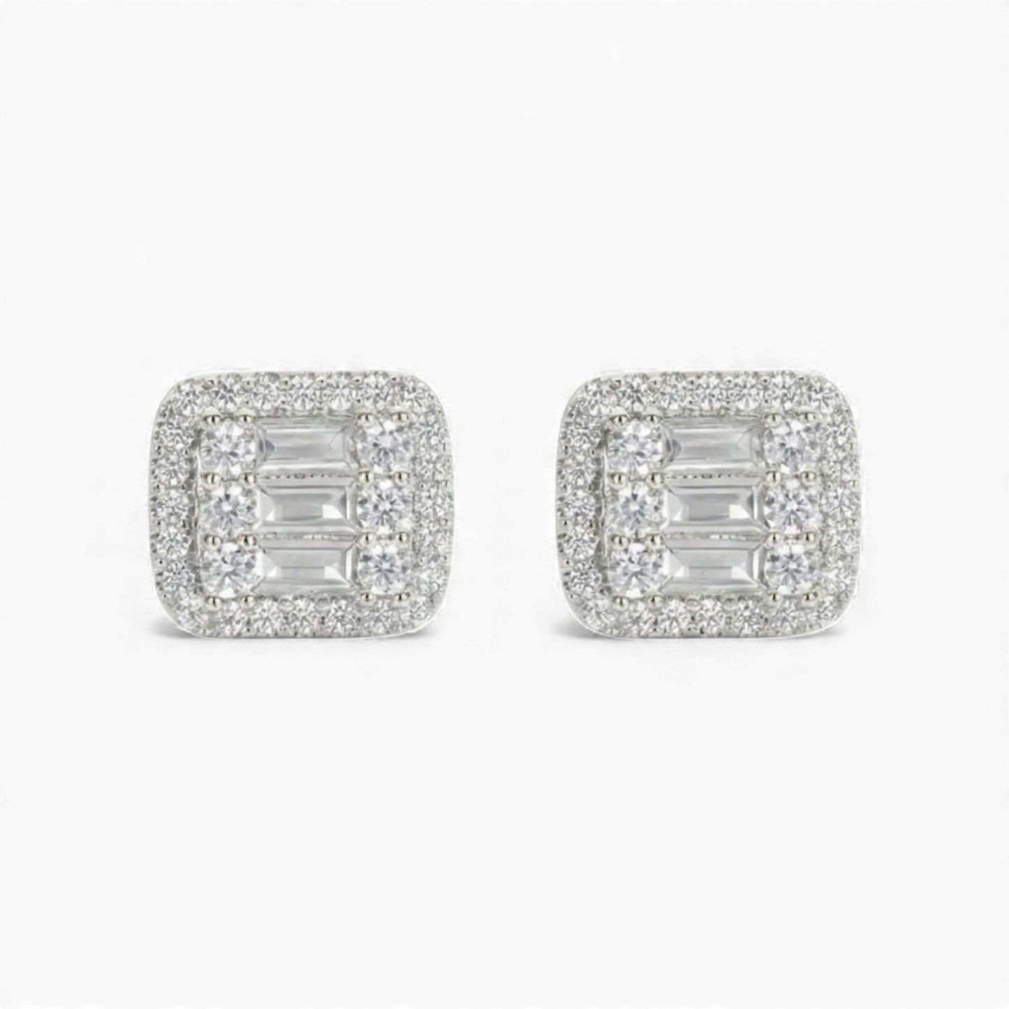 Pair of diamond earrings on a white background