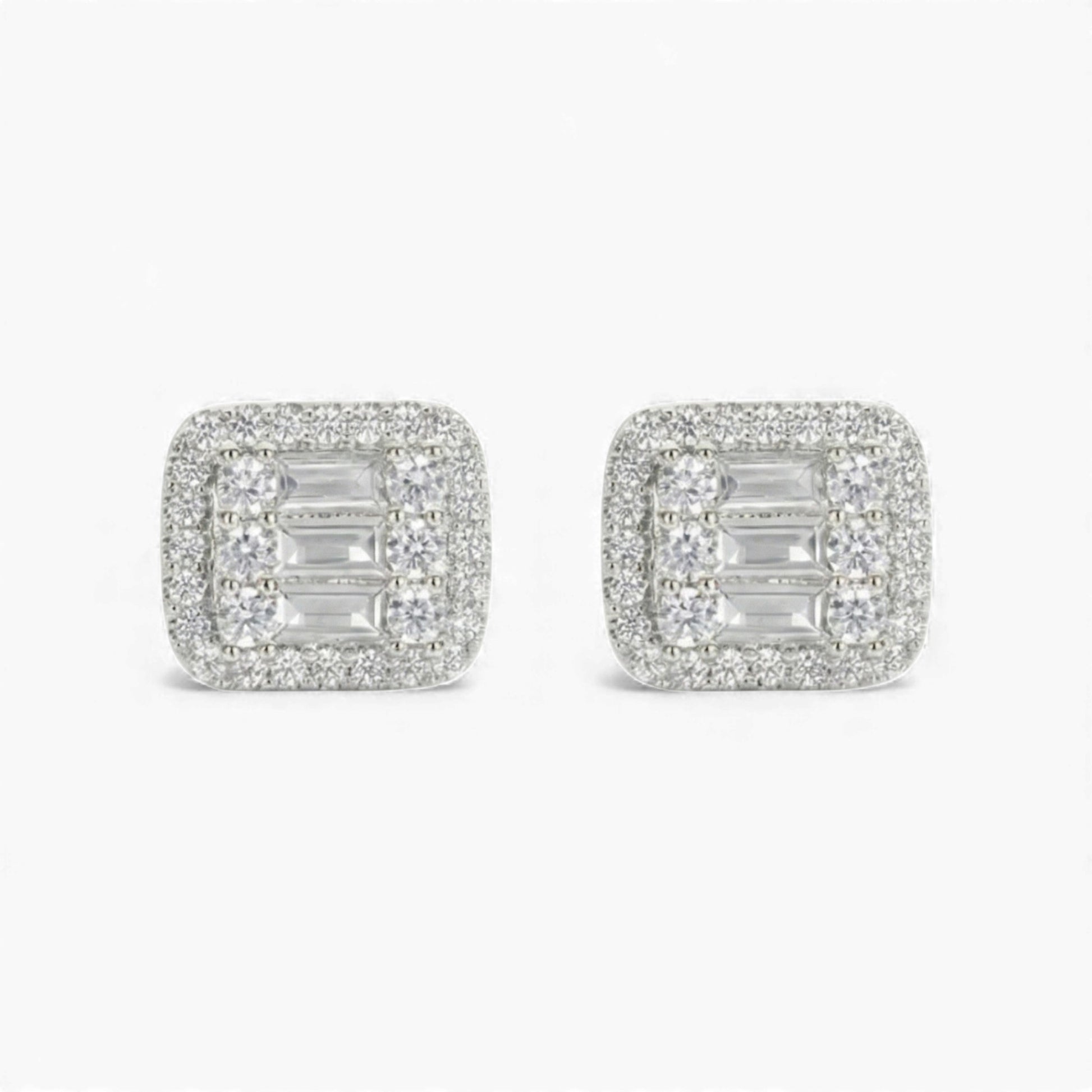 Pair of diamond earrings on a white background