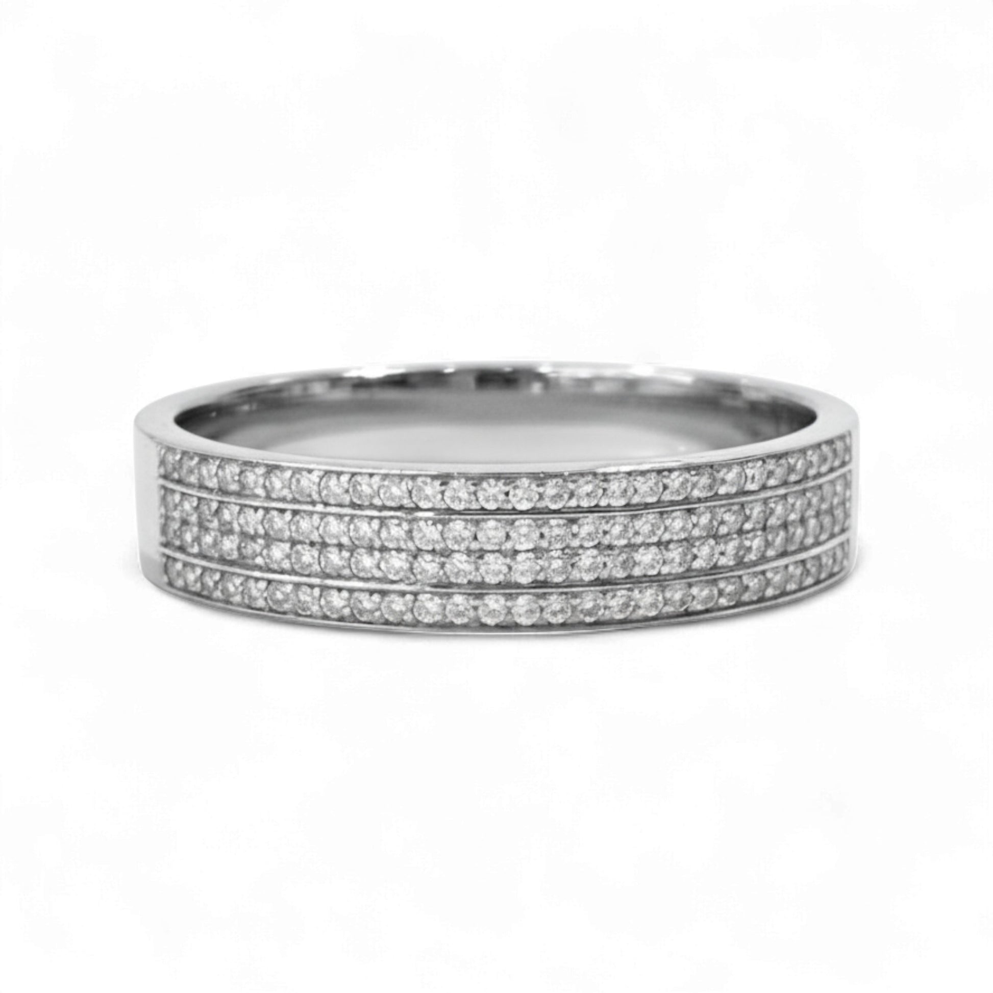 Silver ring with multiple rows of diamonds on a white background