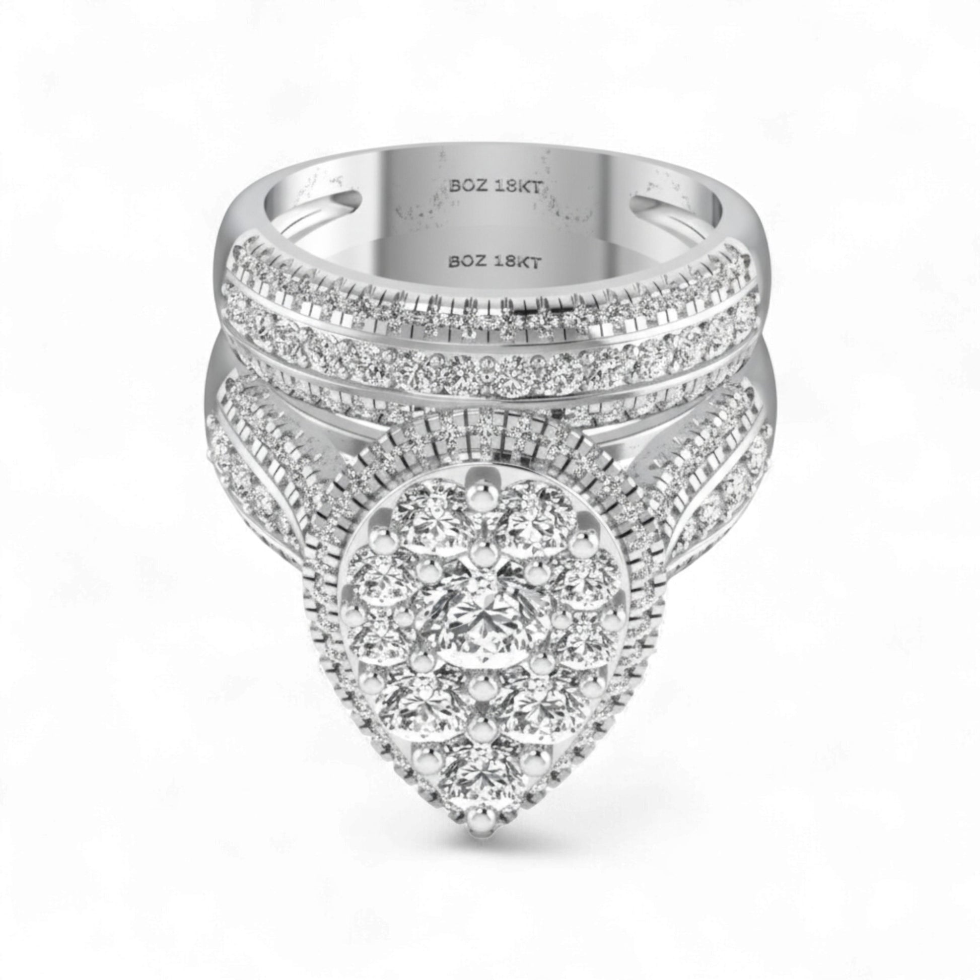 Silver ring with diamond accents on a white background