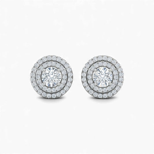 Pair of diamond stud earrings on a white background