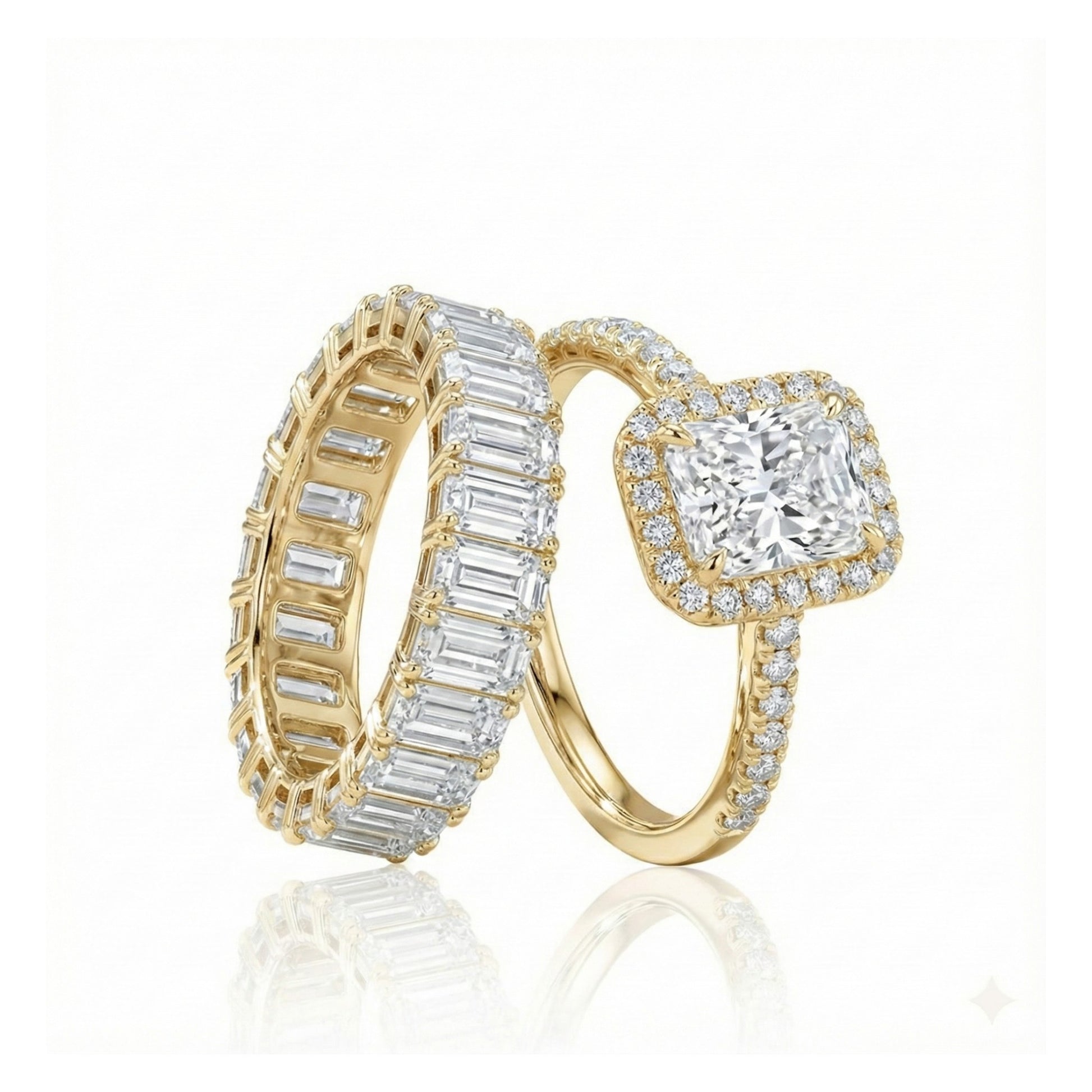 Two gold diamond rings on a white background
