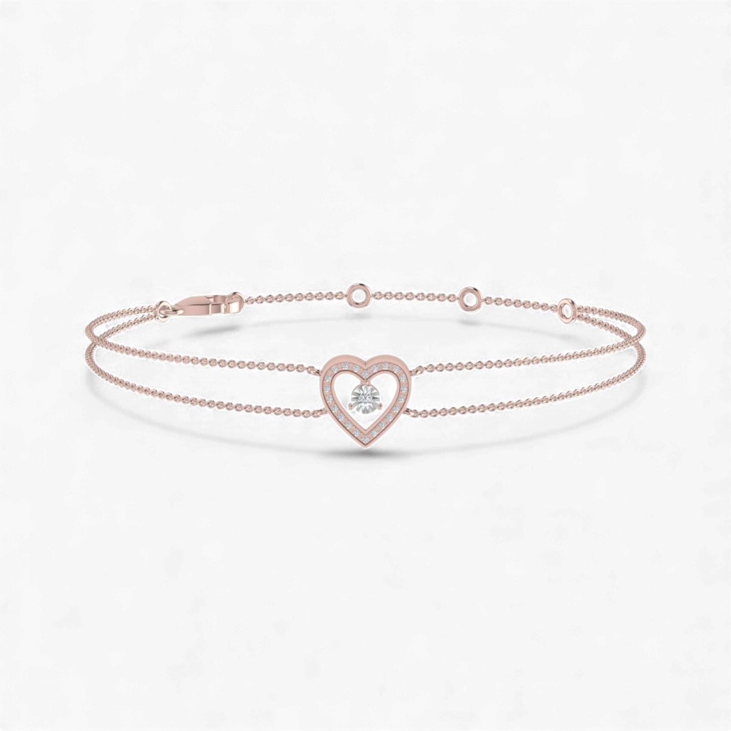 Rose gold bracelet with a heart-shaped clasp on a white background