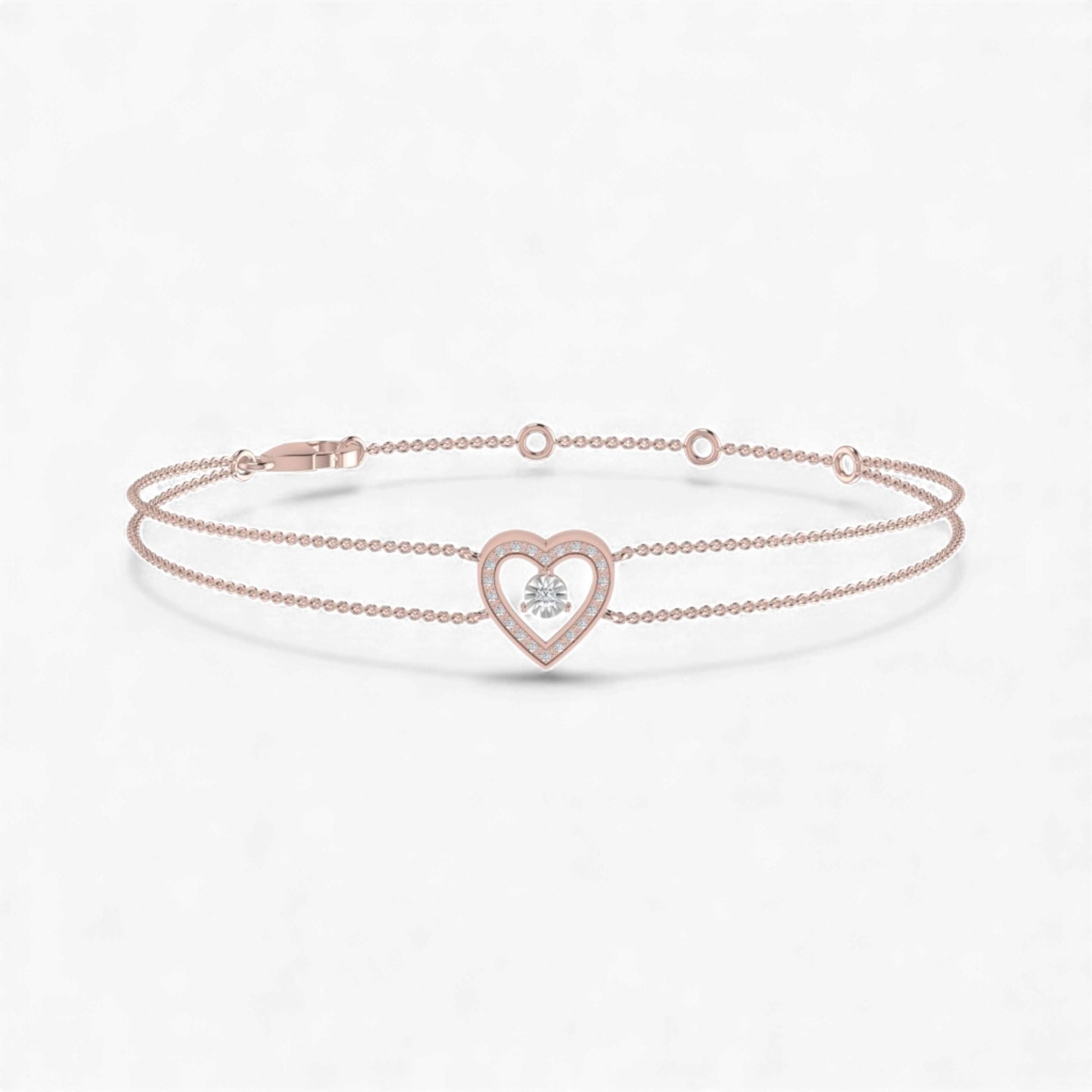 Rose gold bracelet with a heart-shaped clasp on a white background