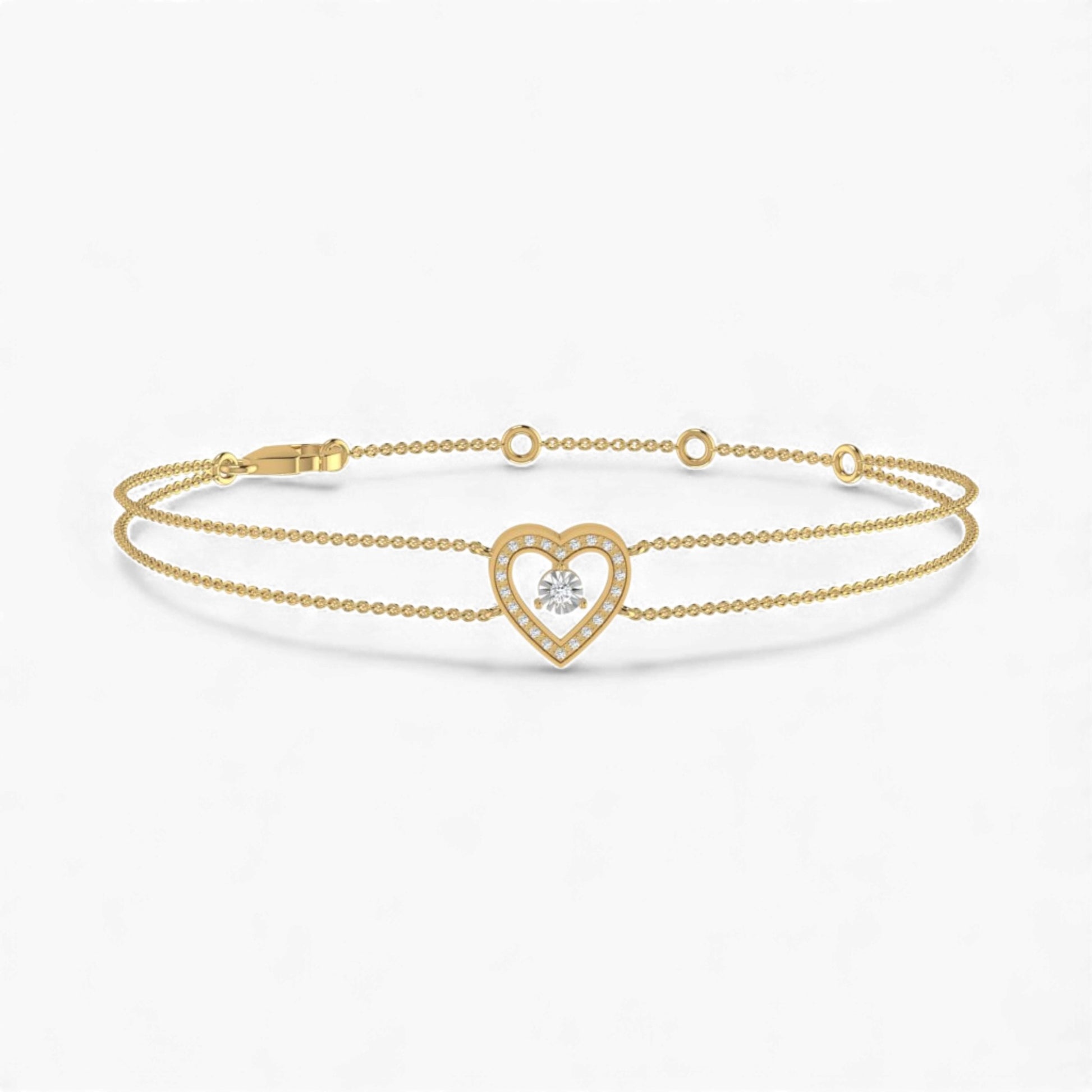 Gold bracelet with a heart-shaped clasp on a white background
