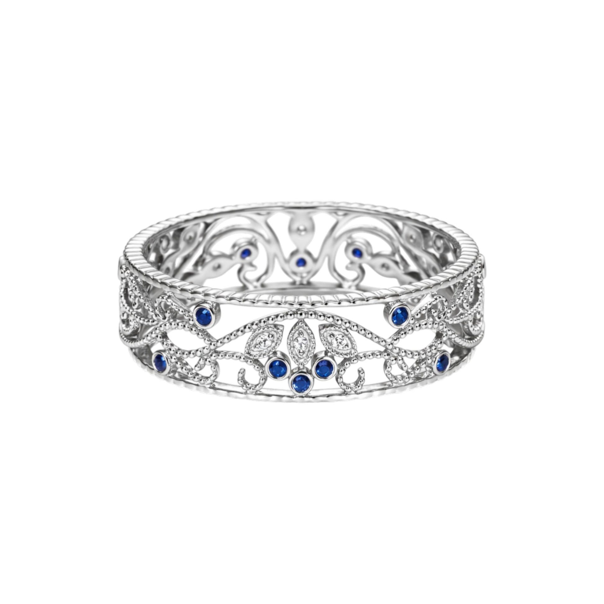 Silver ring with blue gemstones on a white background