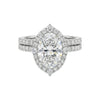 Diamond ring with a pear-shaped center stone on a white background