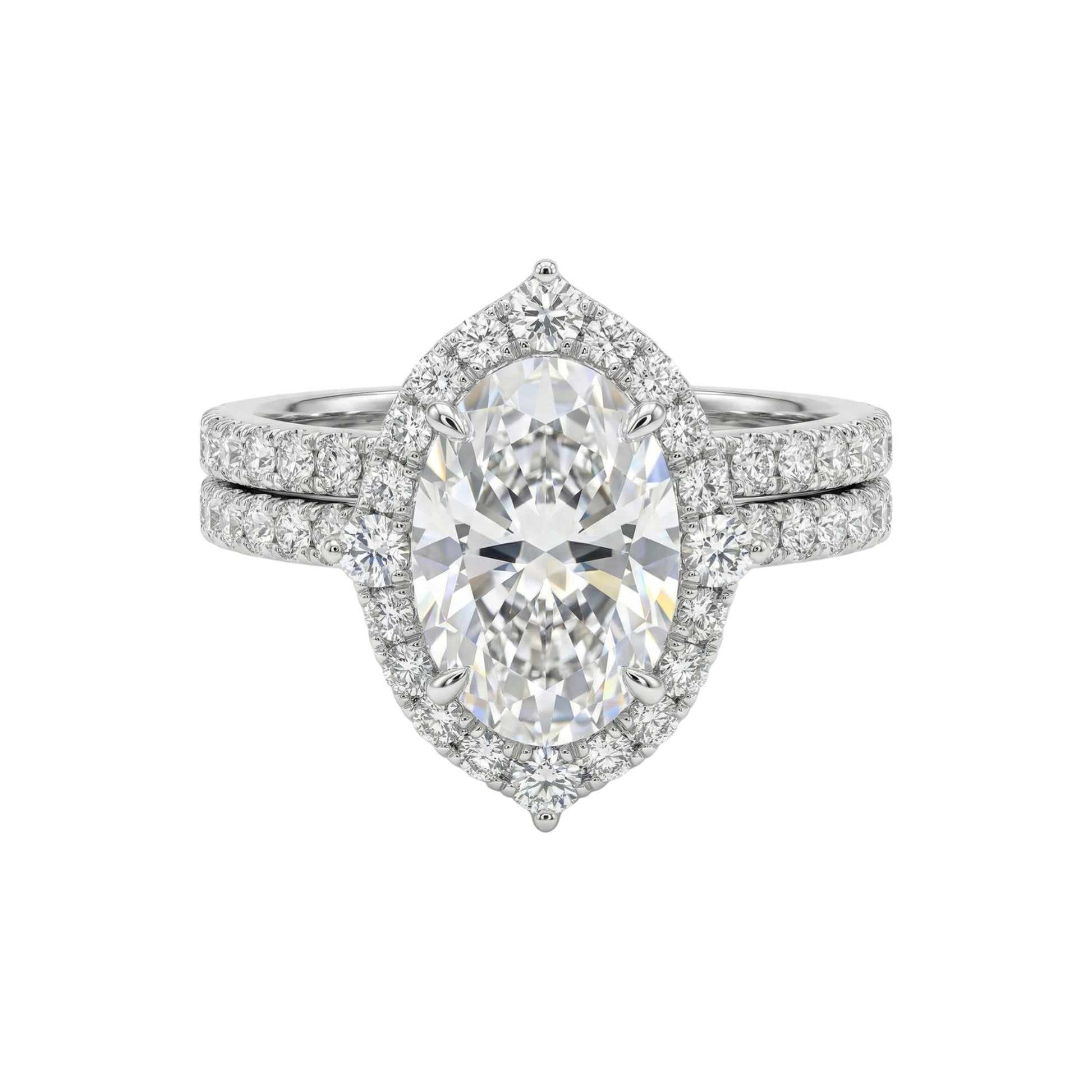 Diamond ring with a pear-shaped center stone on a white background