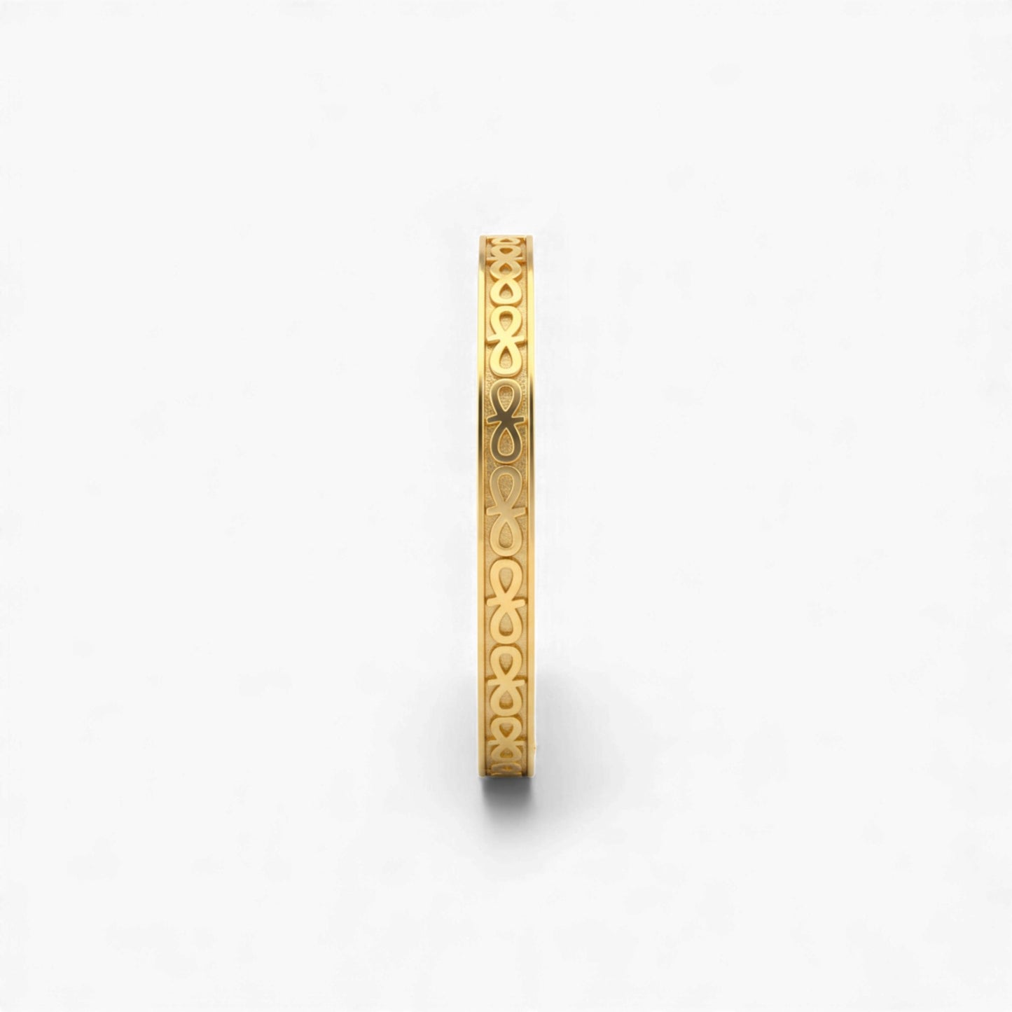 Gold bracelet with intricate design on a white background