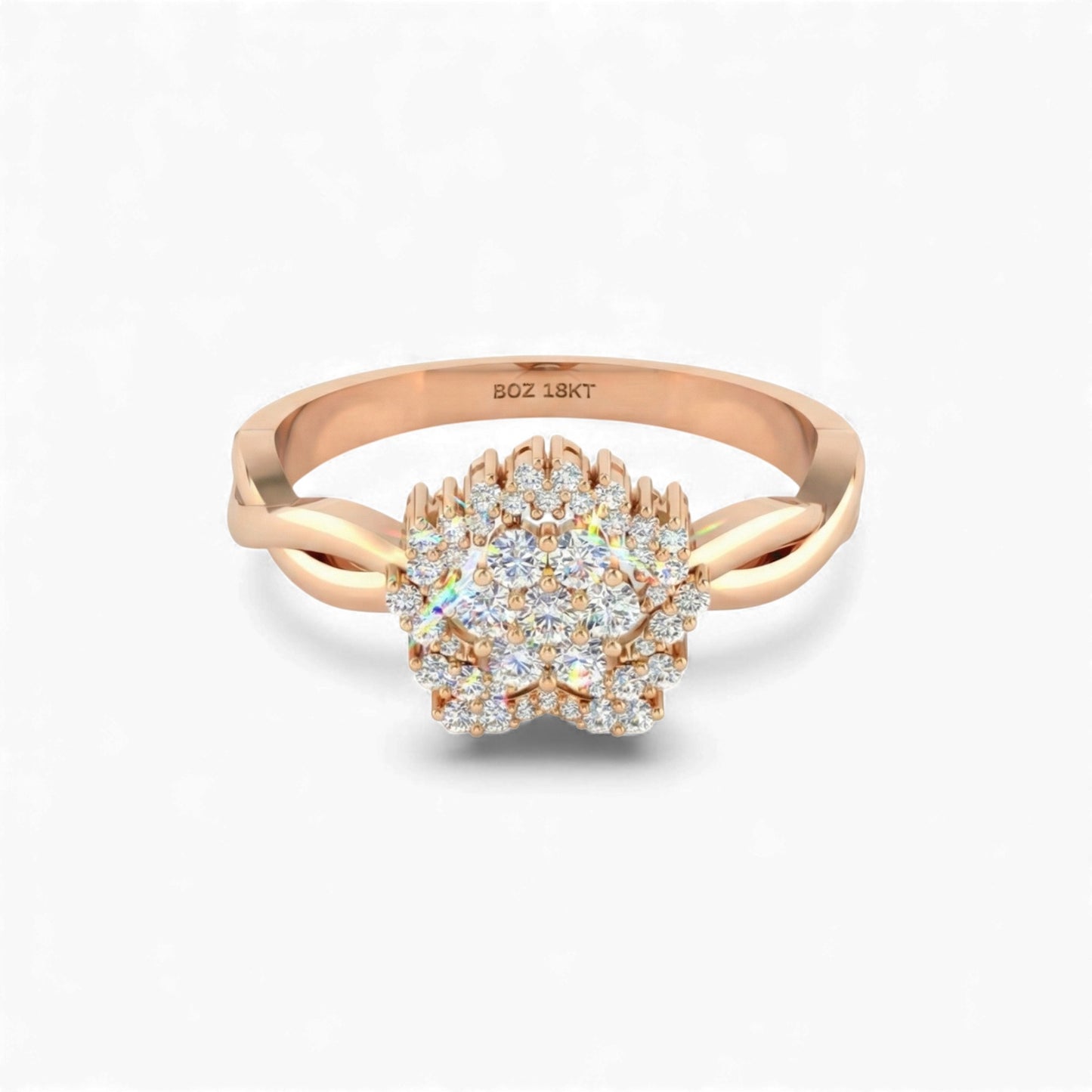 Rose gold ring with diamond cluster on a white background