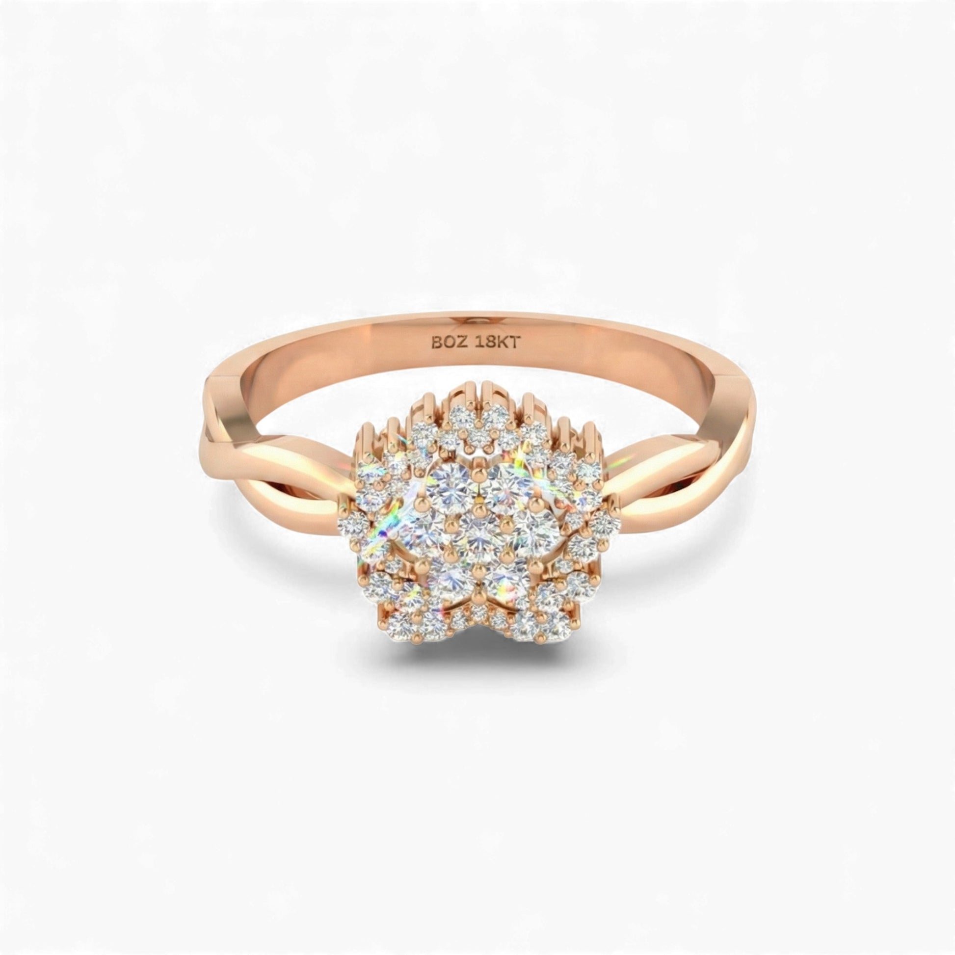 Rose gold ring with diamond cluster on a white background