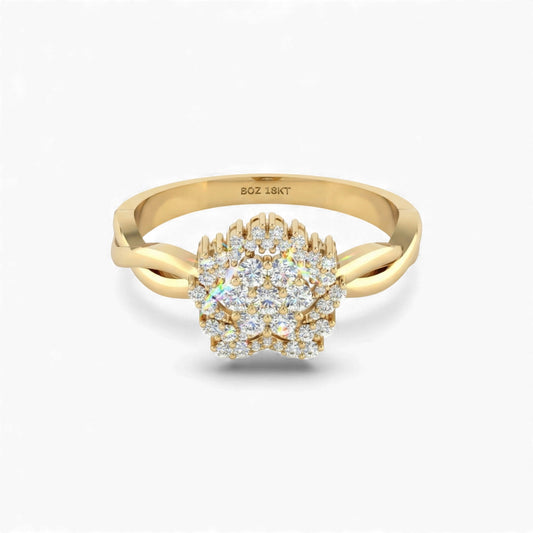 Gold ring with diamond cluster on a white background
