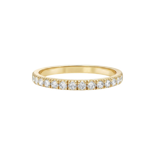 Gold ring with diamonds on a white background