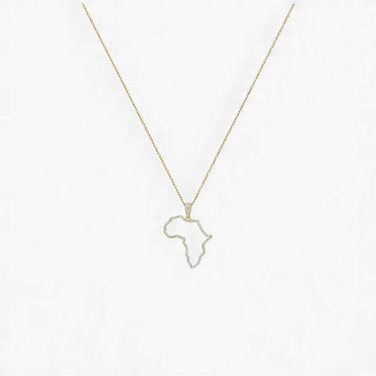Gold necklace with a pendant shaped like the African continent on a light gray background