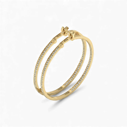 Gold bracelet with diamond accents on a white background