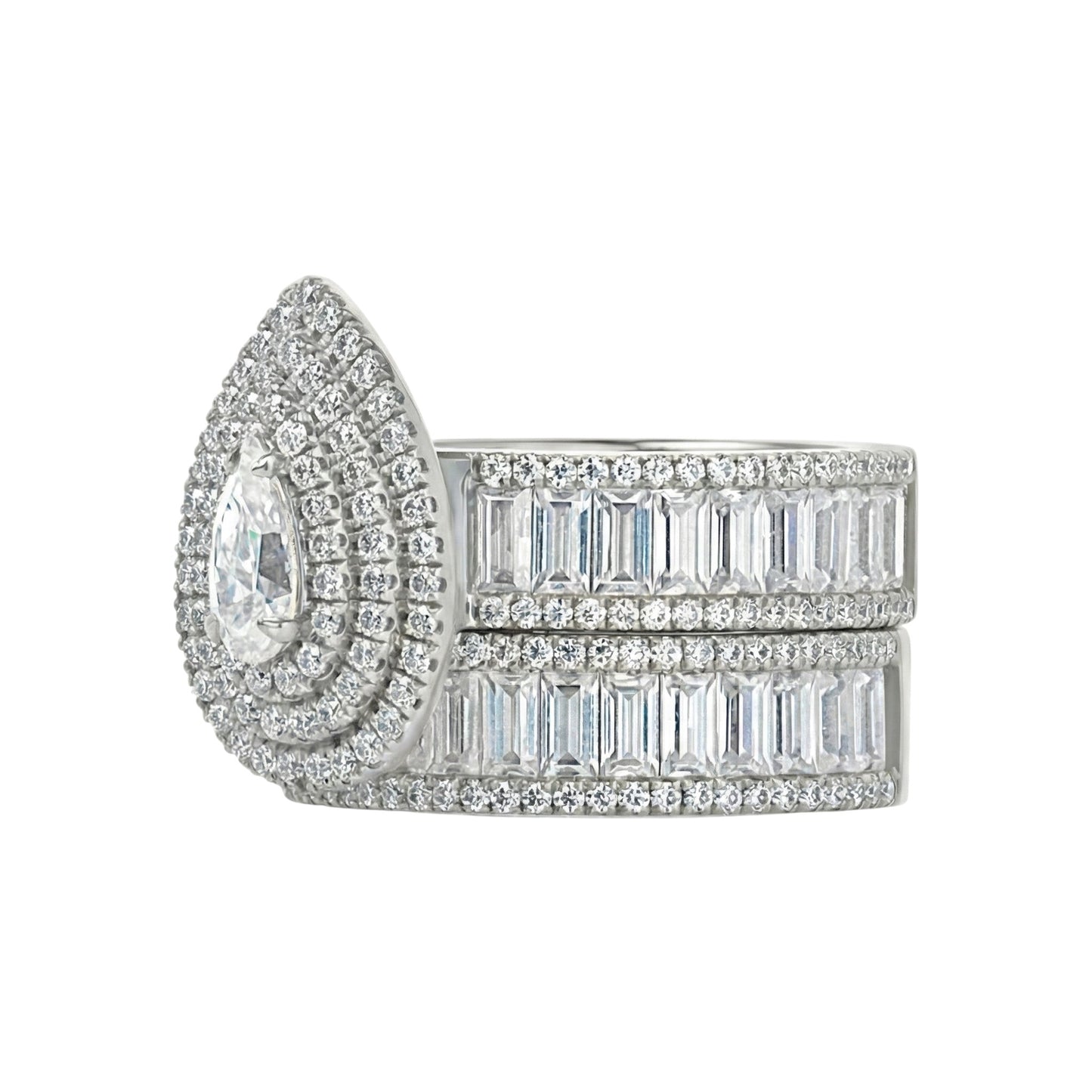 Diamond ring with a large central gemstone and smaller stones on a white background