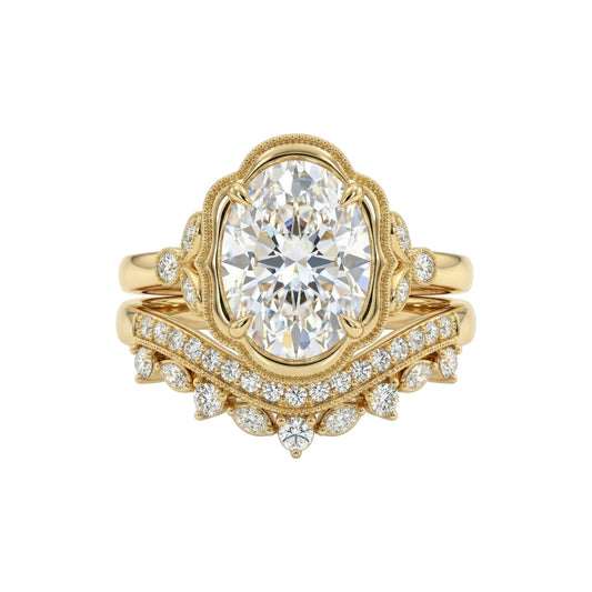 Gold ring with a large diamond and smaller diamonds on the band against a white background