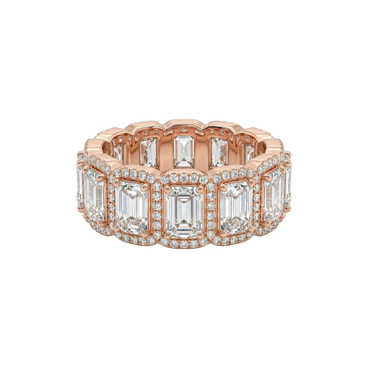 Rose gold ring with emerald-cut diamonds on a white background