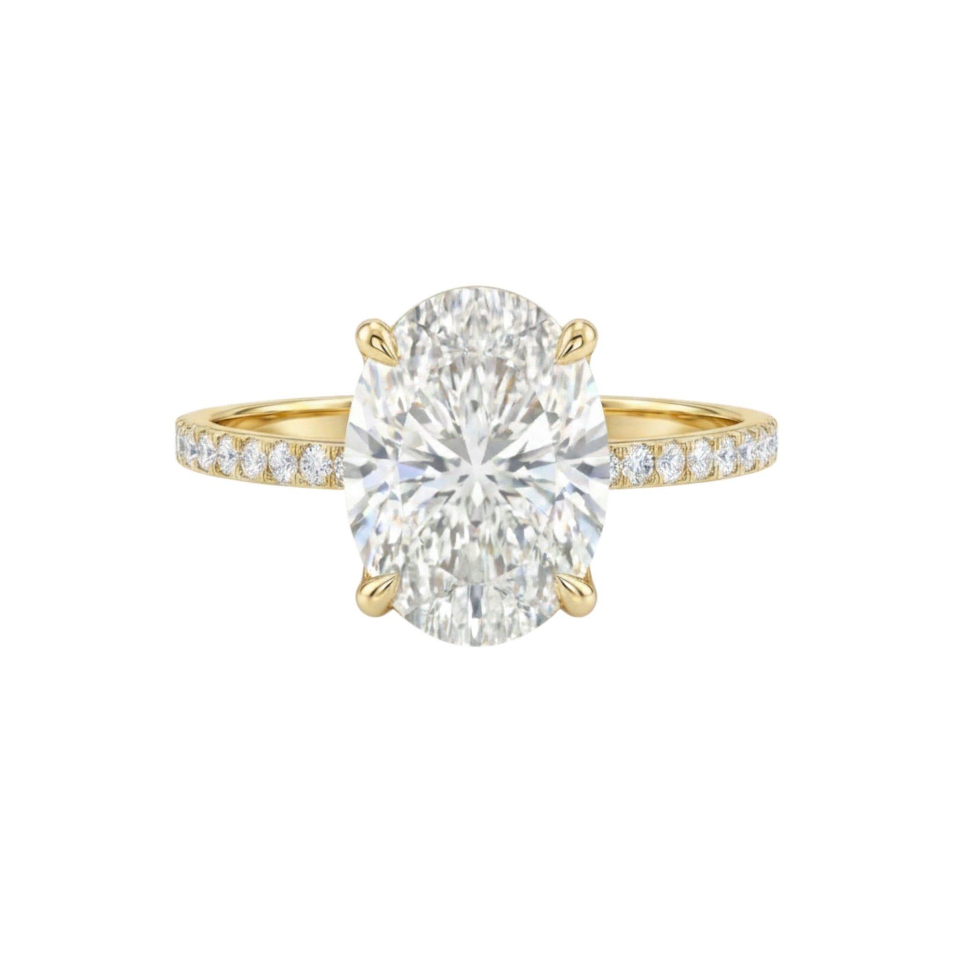 Gold ring with a large diamond and smaller diamonds on the band against a white background