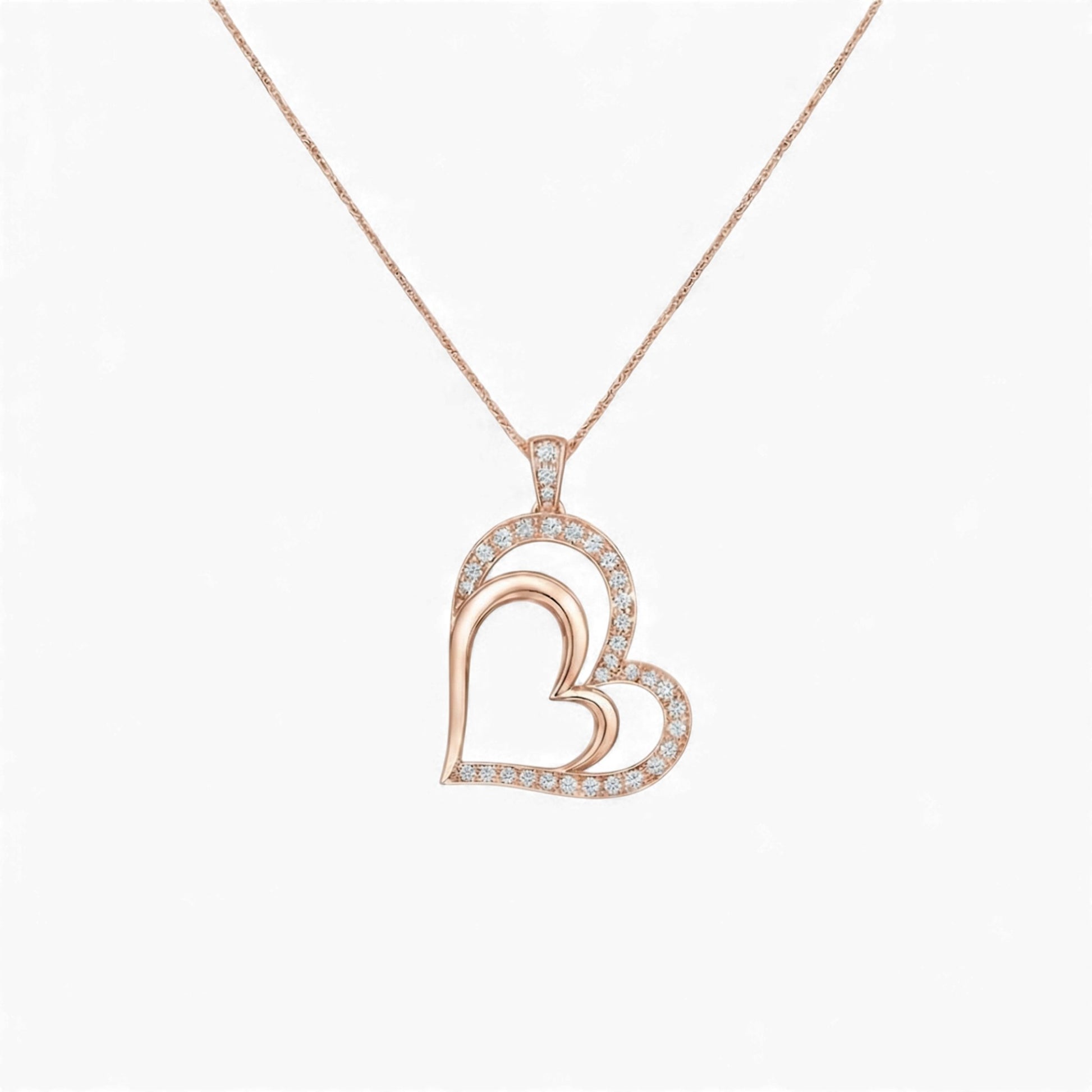 Rose gold heart-shaped necklace with diamonds on a white background