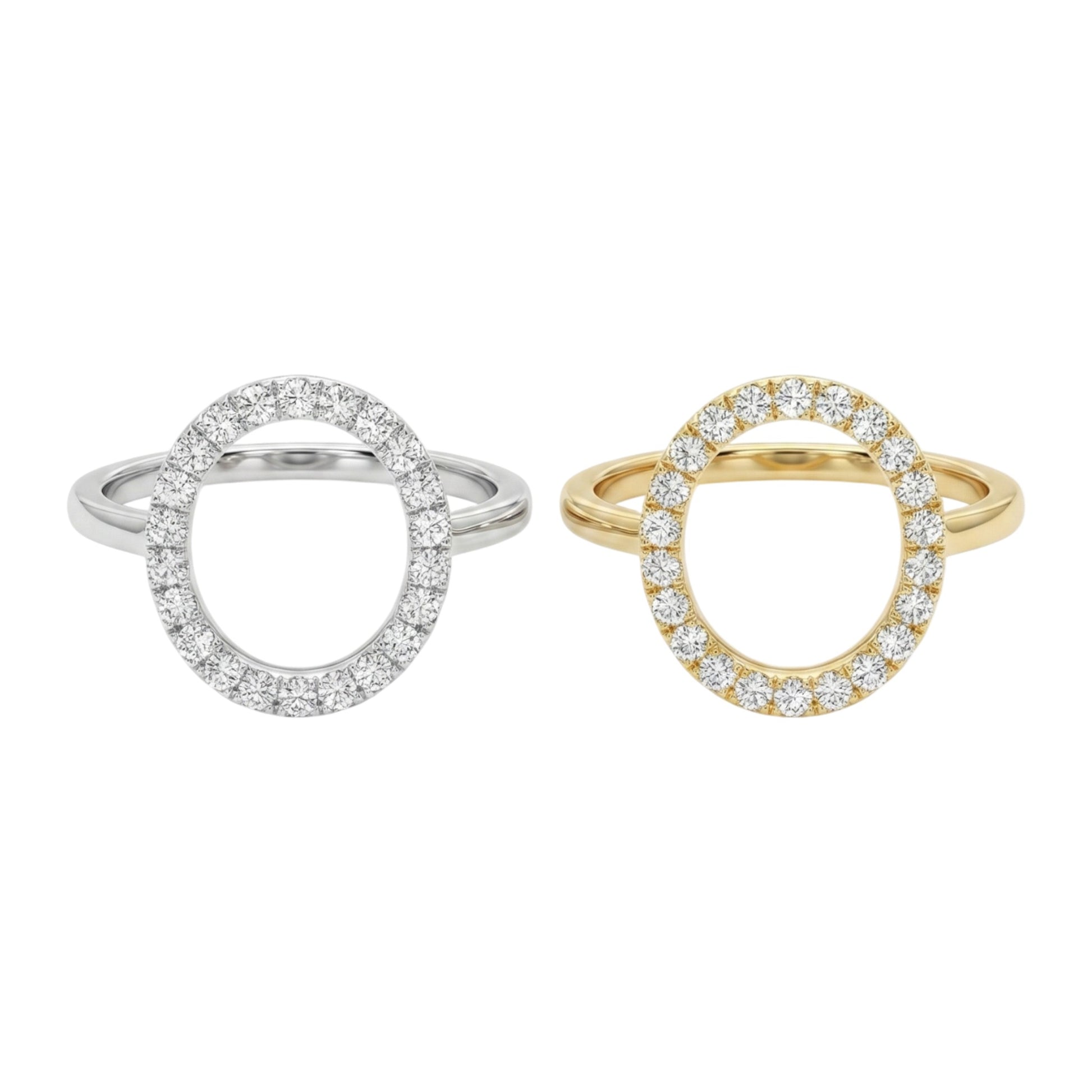 Two diamond rings, one silver and one gold, on a white background