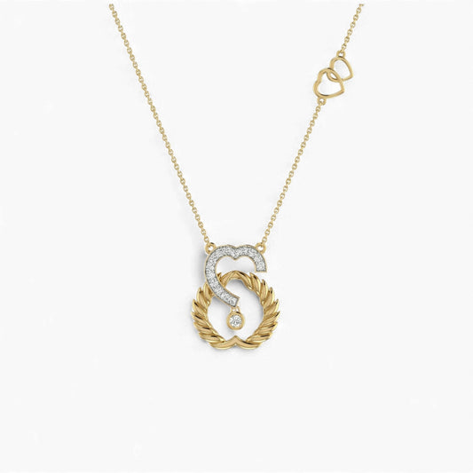 Gold and silver necklace with a unique pendant on a white background