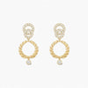Gold earrings with interlocking rings and small diamonds on a white background