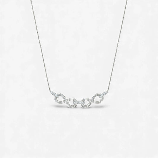 Silver necklace with a unique design on a white background