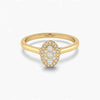 Gold ring with diamond oval design on a white background