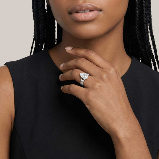 Leona Pear Cut CZ Bride Set and Wishbone Band in 925 Sterling Silver on woman's hand