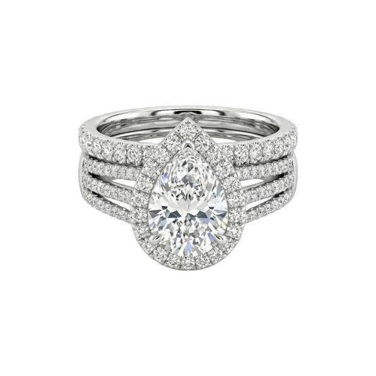 Diamond ring with a pear-shaped center stone on a white background