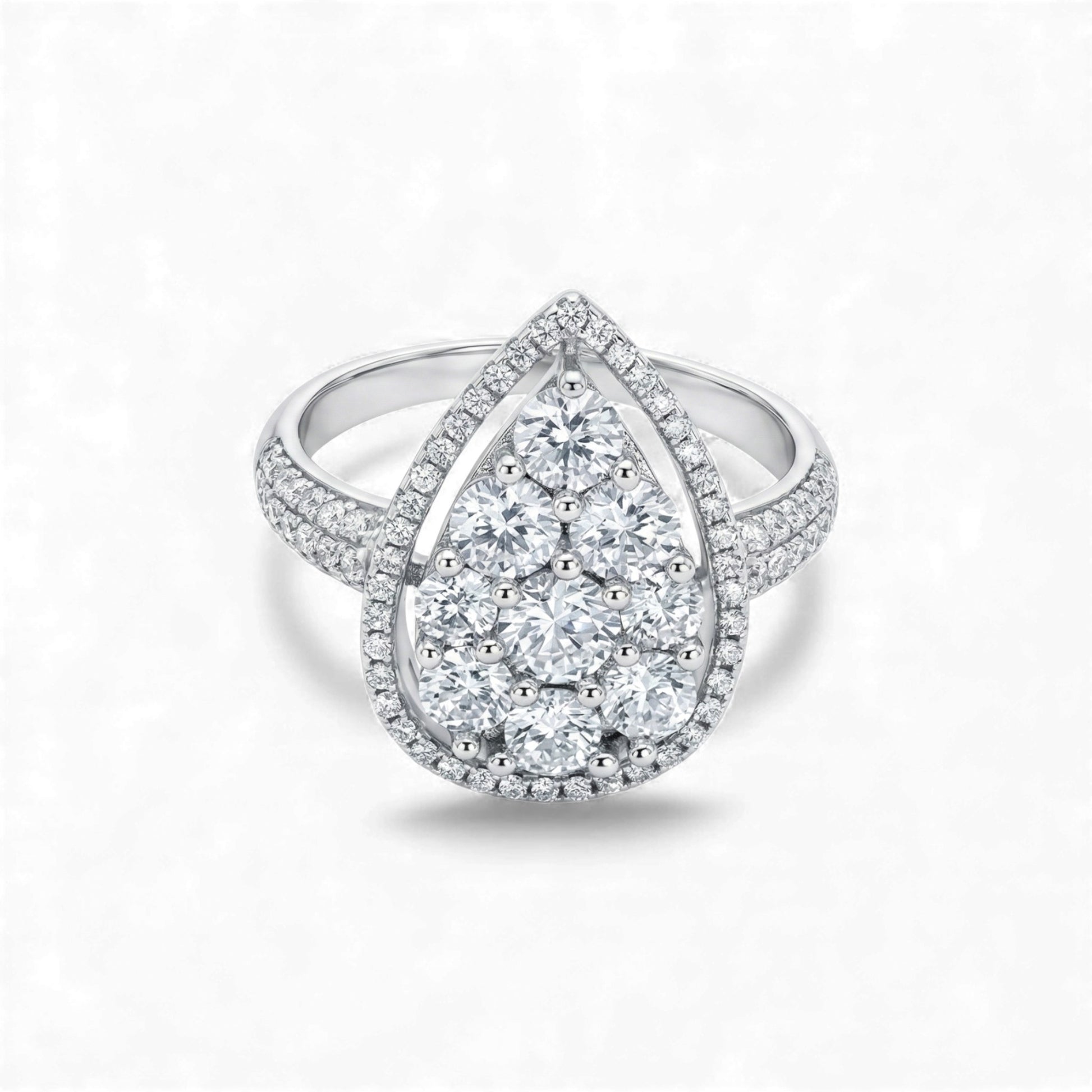 Silver ring with diamond accents on a white background