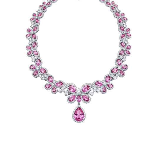 Necklace with pink gemstones on a white background
