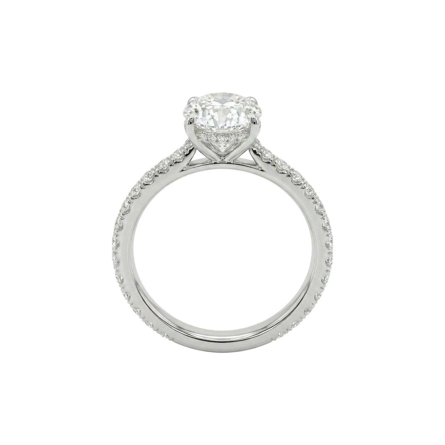 Diamond ring with a heart-shaped center stone on a white background
