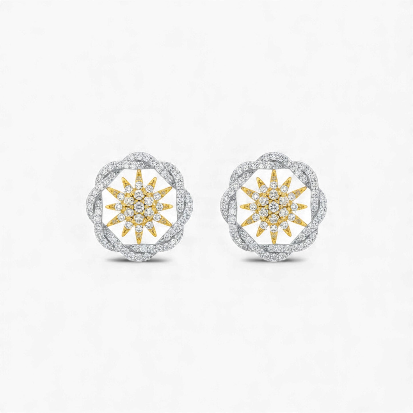 Pair of earrings with sunflower design on a white background
