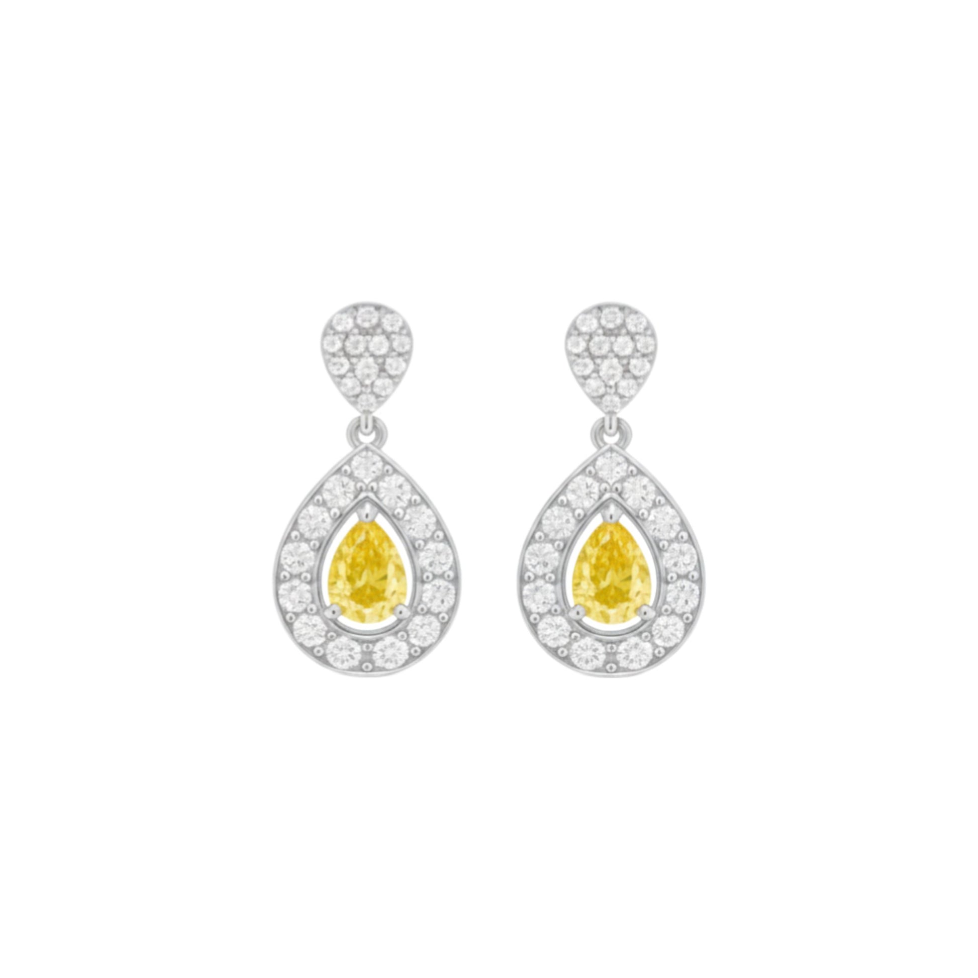 Pair of earrings with yellow gemstones and diamond accents on a white background