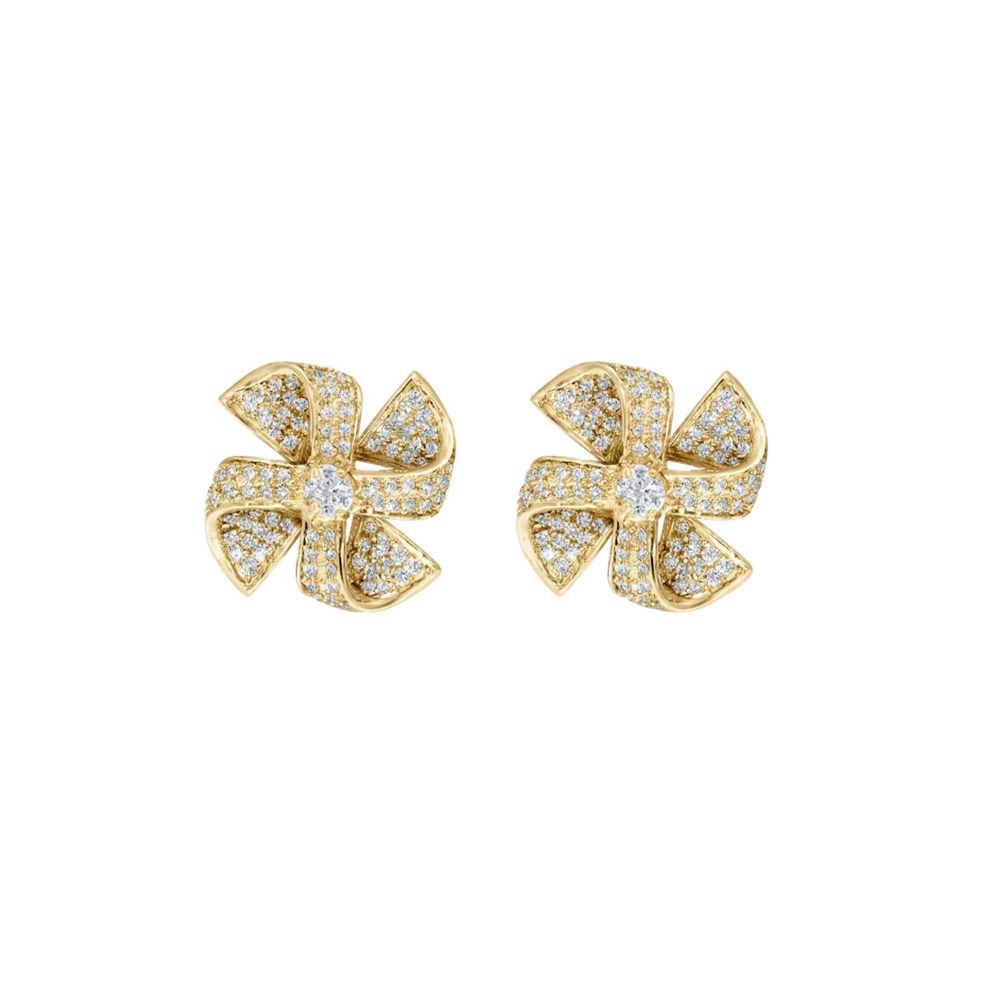 Gold bow-shaped earrings with diamond accents on a white background