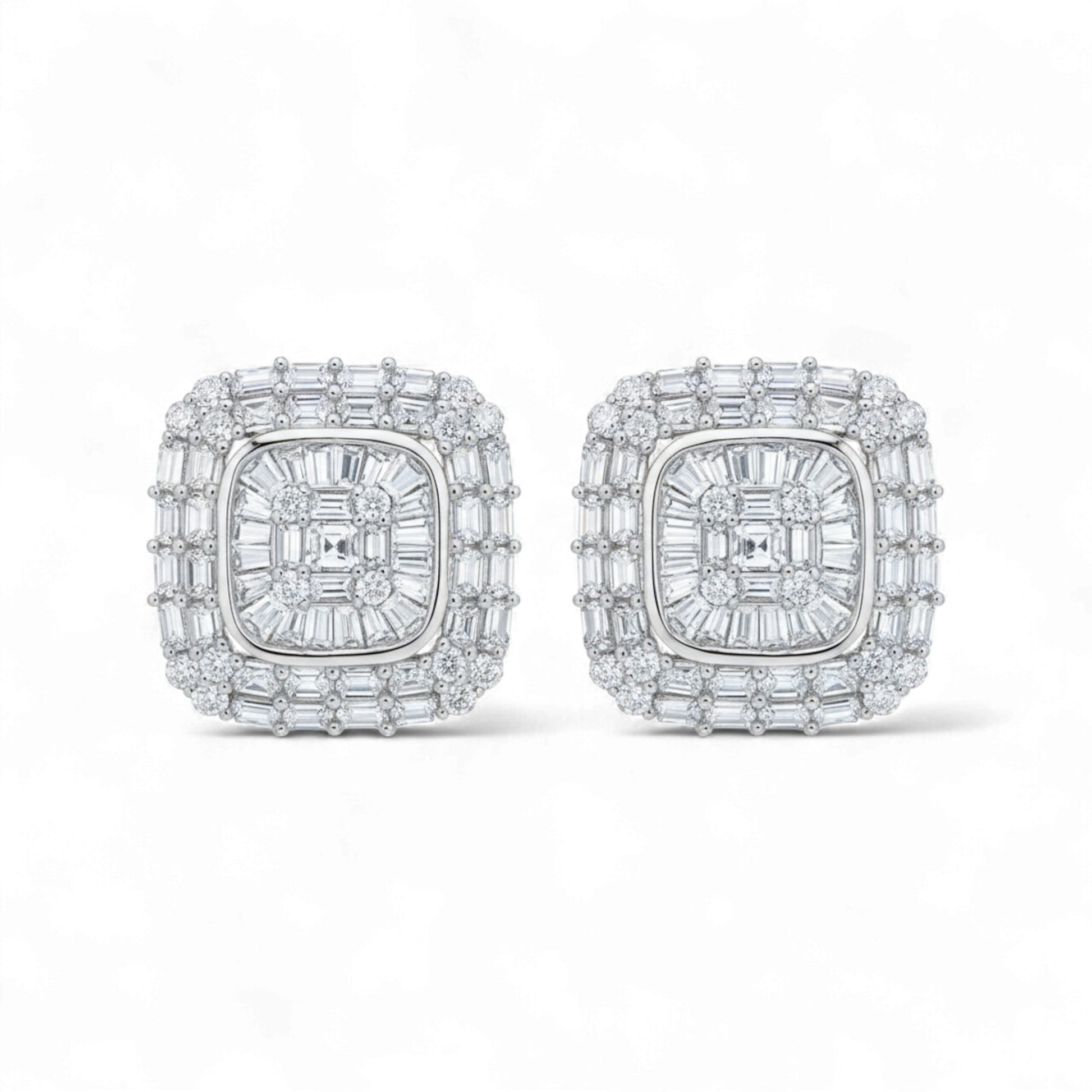 Pair of diamond earrings on a white background